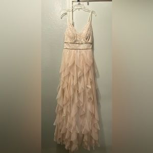 Beautiful formal spaghetti strap dress. Kind of a peachy-cream color.